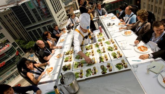 Diners suspended high above the city