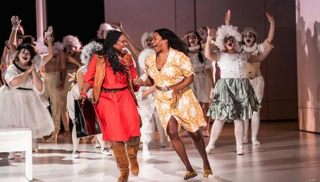 Nadine Benjamin and Elizabeth Llewellyn are joyful friends at the start of Luisa Miller. Photo: Tristram Kenton