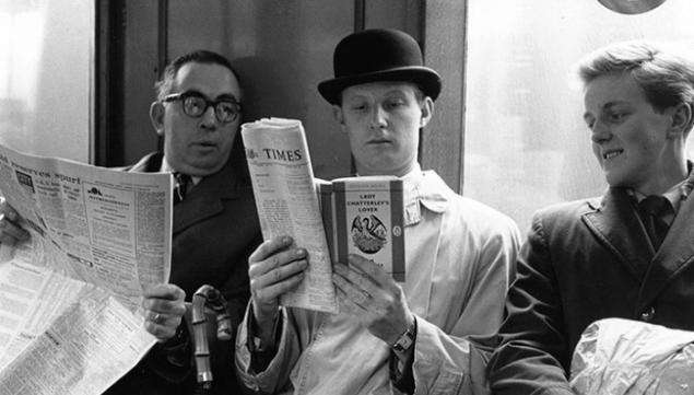 1960: Fox photographer George Freston poses as a commuter on the tube, reading a copy of D H Lawrence's novel Lady Chatterley's Lover, on the day the book went on ...