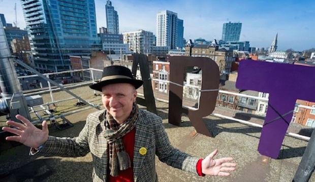 Bob and Roberta Smith with test letters for the planned ART MAKES PEOPLE POWERFUL installation on Central House Roof 